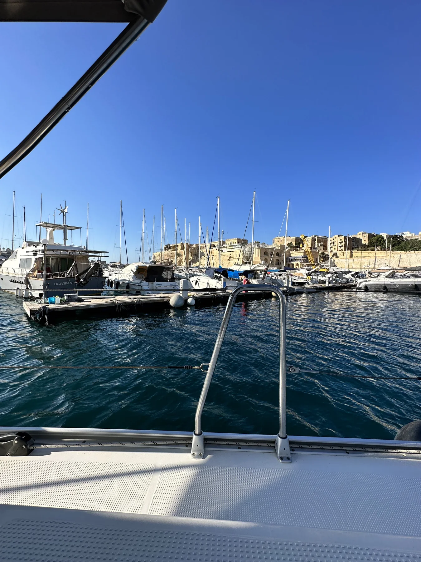 Cockpit and marina view in evening light.